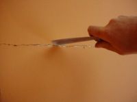 clearing debris from cracks