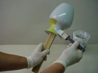 base coating a glass flower vase
