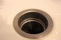 photo a garbage disposal in sink view
