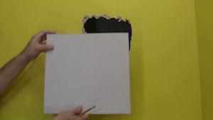 a piece of drywall to patch a hole