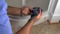 cleaning caulk on a rag