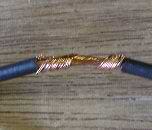 twisting wires together to splice a lamp cord