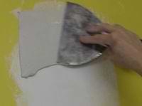 applying a final skim coat of joint compound