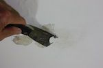 scraping plaster water damage