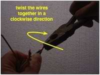 photo twisting clockwise to splice wires together
