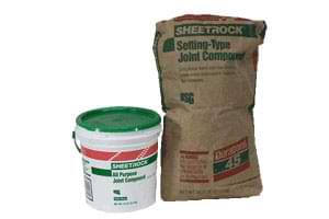 photo of a bag of setting-type and a bucket of ready-mixed joint compounds photo of a bag of setting-type and a bucket of ready-mixed joint compounds