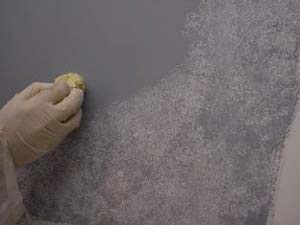 photo demonstrating how to apply the first coat of glaze for a stone faux finish photo demonstrating how to apply the first coat of glaze for a stone faux finish