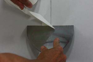 photo cutting paper drywall tape square with a joint knife photo cutting paper drywall tape square with a joint knife
