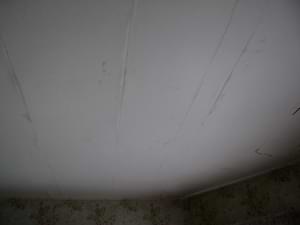 photo damaged drywall on ceiling