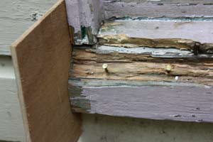 photo using plywood to build a form around a rotted wood windowsill