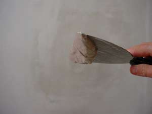 photo of joint compound on a drywall joint knife photo of joint compound on a drywall joint knife