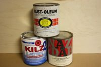 photo of 3 quart-sized cans of paint and primer