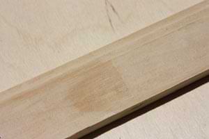 photo of paint-grade wood baseboard molding with finger-joints photo of paint-grade wood baseboard molding with finger-joints