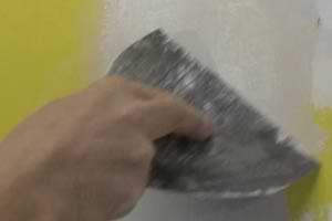 photo skimming a second coat of joint compound over a drywall paper patch photo skimming a second coat of joint compound over a drywall paper patch