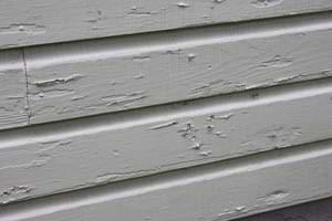 photo peeling paint on house dutch lap siding siding