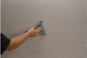 photo smoothing the surface of a final plaster white coat photo smoothing the surface of a final plaster white coat