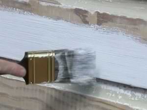 photo demonstration priming bare wood