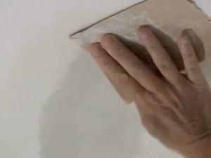 photo sanding a repaired ceiling drywall patch photo sanding a repaired ceiling drywall patch