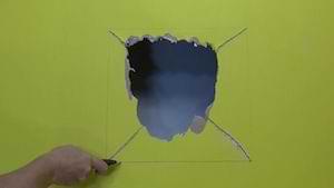 photo scoring drywall with a razor knife photo scoring drywall with a razor knife