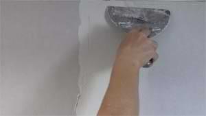 photo skimming joint compound along the edge of a drywall butt joint photo skimming joint compound along the edge of a drywall butt joint
