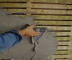 photo applying a scratch coat over wood lath photo applying a scratch coat over wood lath