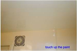 photo sanding a drywall patch photo sanding a drywall patch