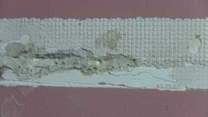 photo trimmed spray foam in a wall crack photo trimmed spray foam in a wall crack