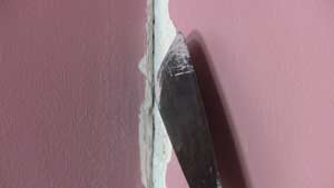 photo clearing a wall crack photo clearing a wall crack