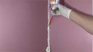 photo of foam filling a wall crack photo of foam filling a wall crack